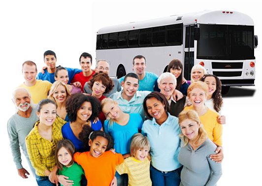 Group of people hugging and smiling in front of white church bus