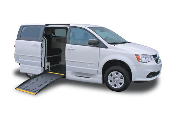 White van with wheelchair ramp from side door