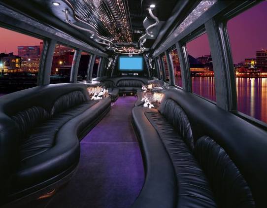 Black leather interior of party bus