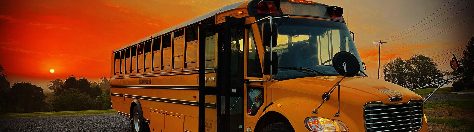 yellow school bus at sunset