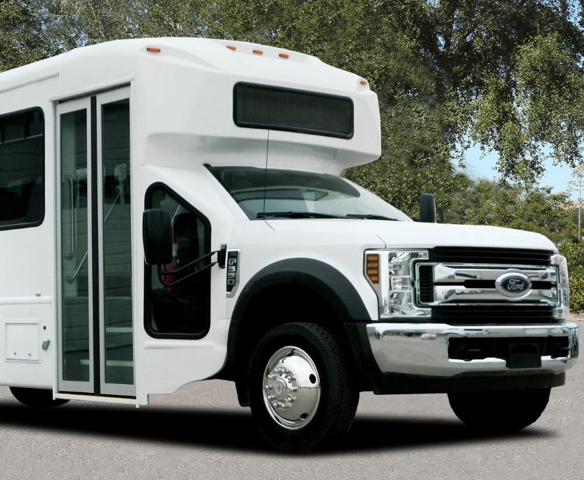 White Ford passenger bus
