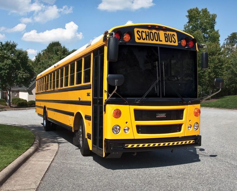 yellow school bus in neighborhood cul-de-sac